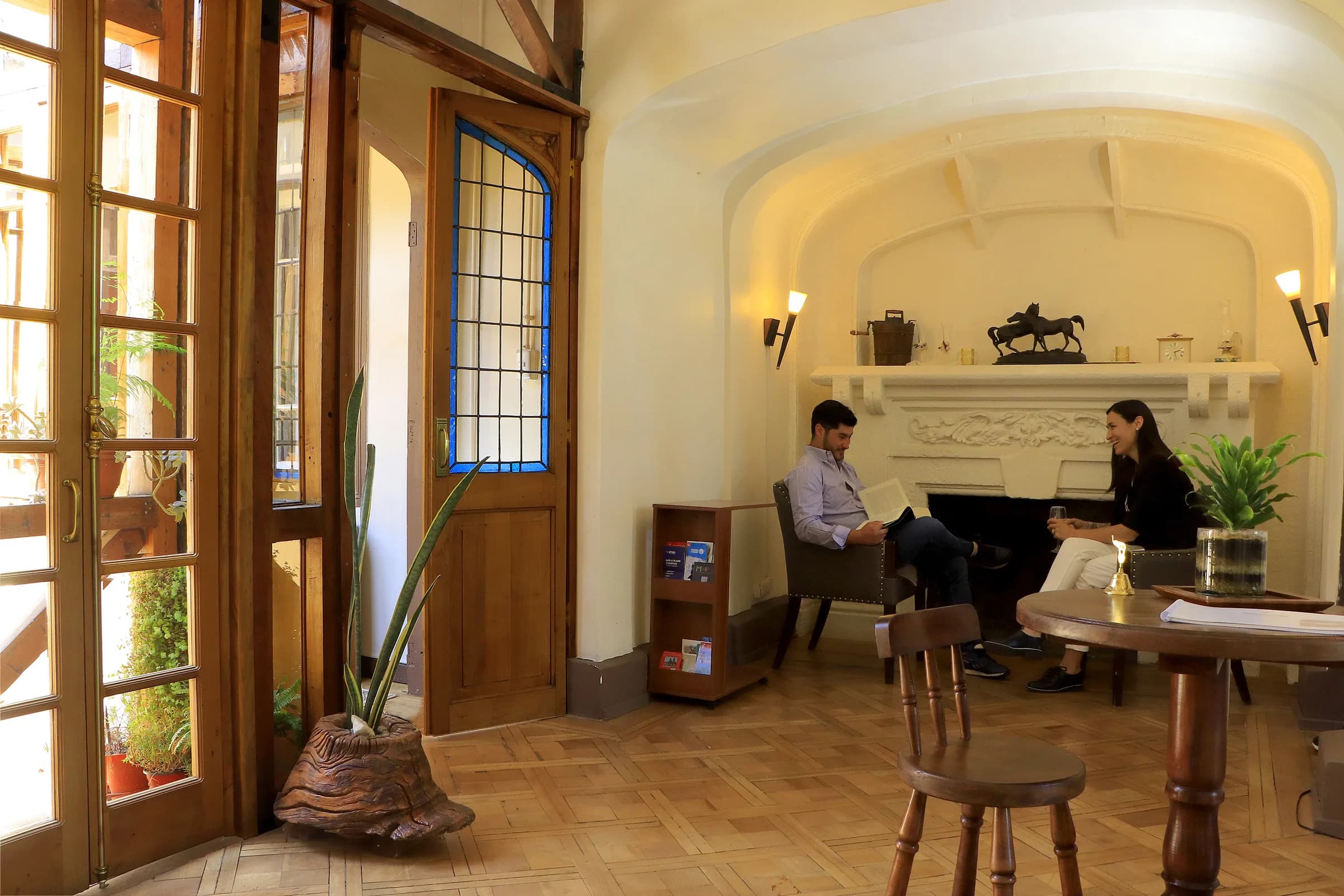 Lounge with fireplace at Casa Conde